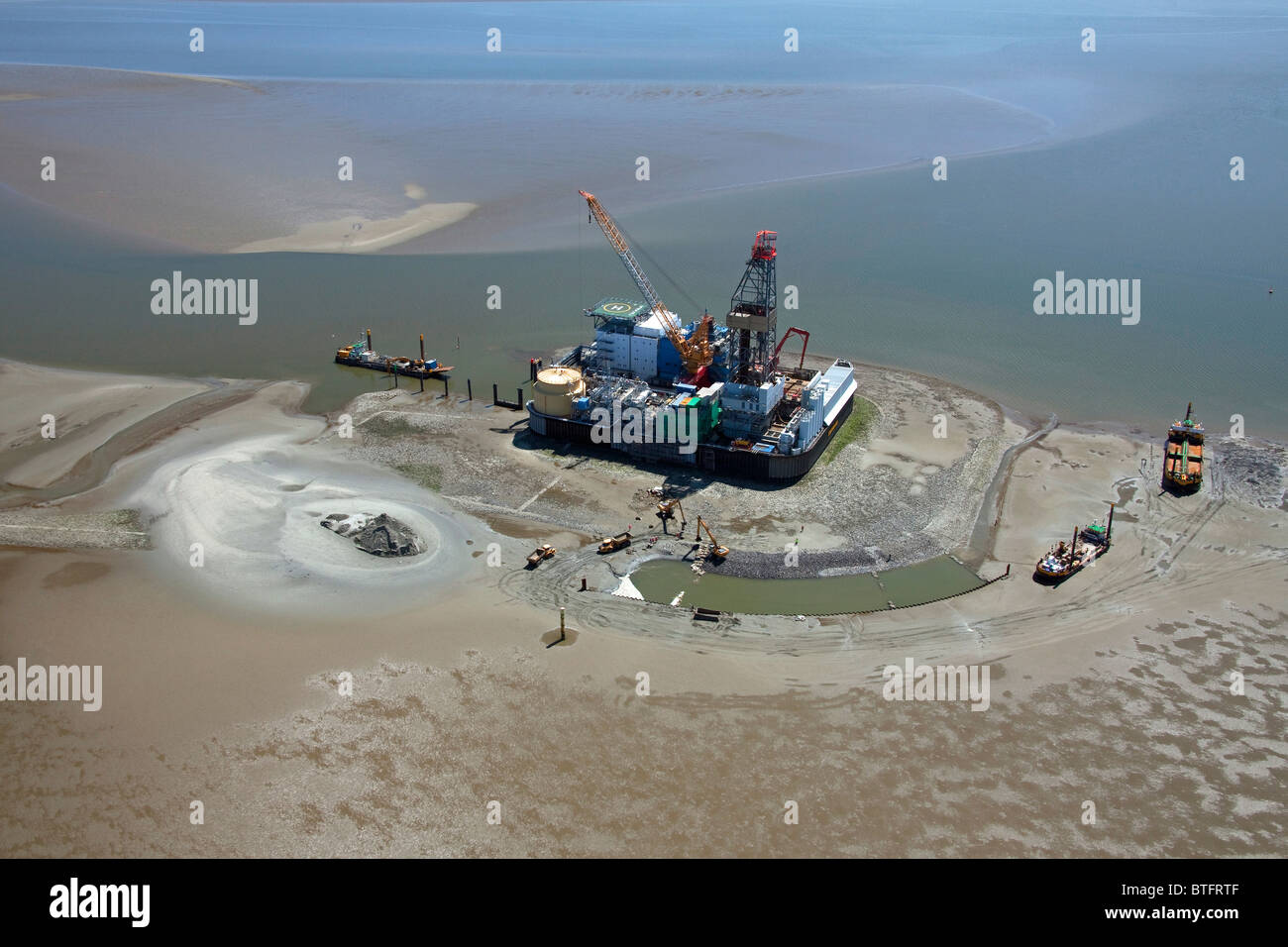 Oil rig and protection platform Mittelplate in the North Sea off Schleswig-Holstein, Germany. Stock Photo