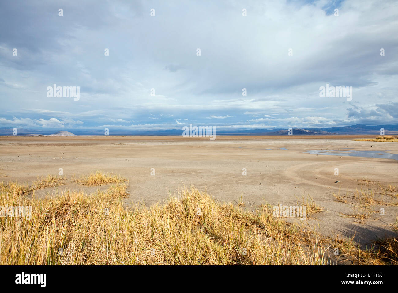 Thunderstorm moves in on a Mojave desert dry lake at Zzyzx, California. Stock Photo