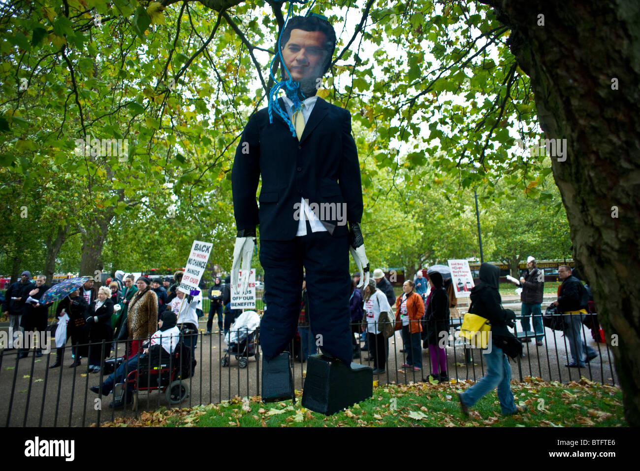 Effigy of George Osborne being hanged as a protest against UK government spending cuts Stock Photo