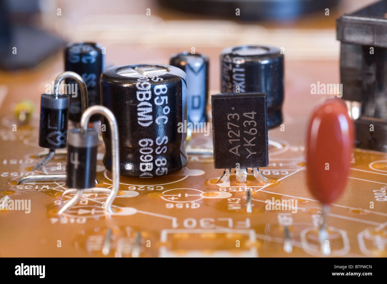 Transistor next to an Electrolytic capacitor on an electronic circuit