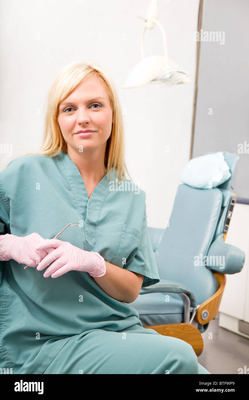 A portrait of a dental worker, dentist or assistant Stock Photo