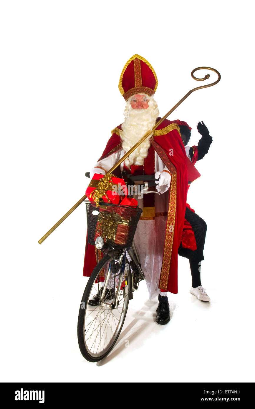 Sinterklaas and Black Piet on the bike Stock Photo - Alamy