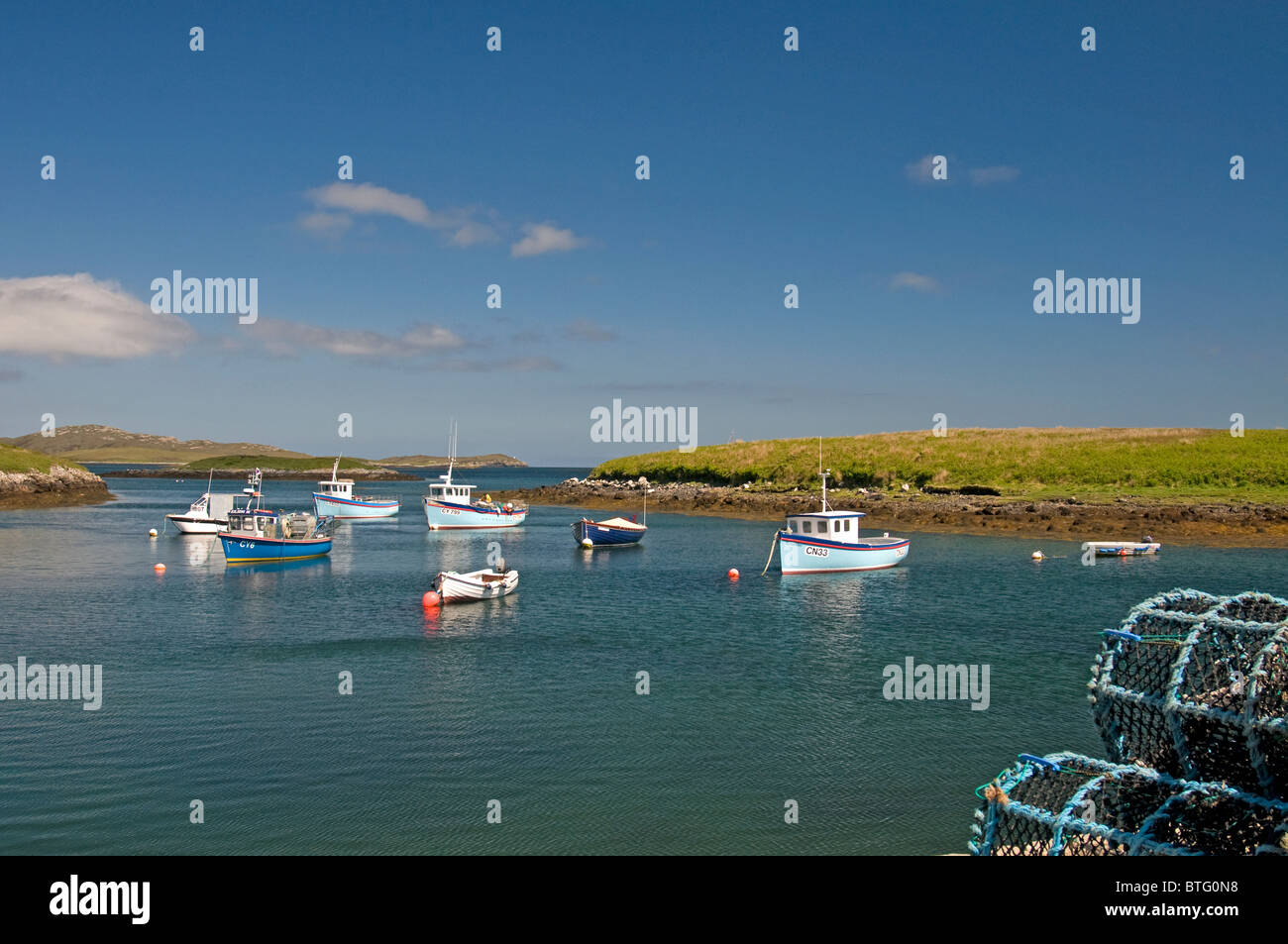 Fishing boats moored at Lochmaddy, North Uist in the Western Isles, Scotland.  SCO 6923 Stock Photo