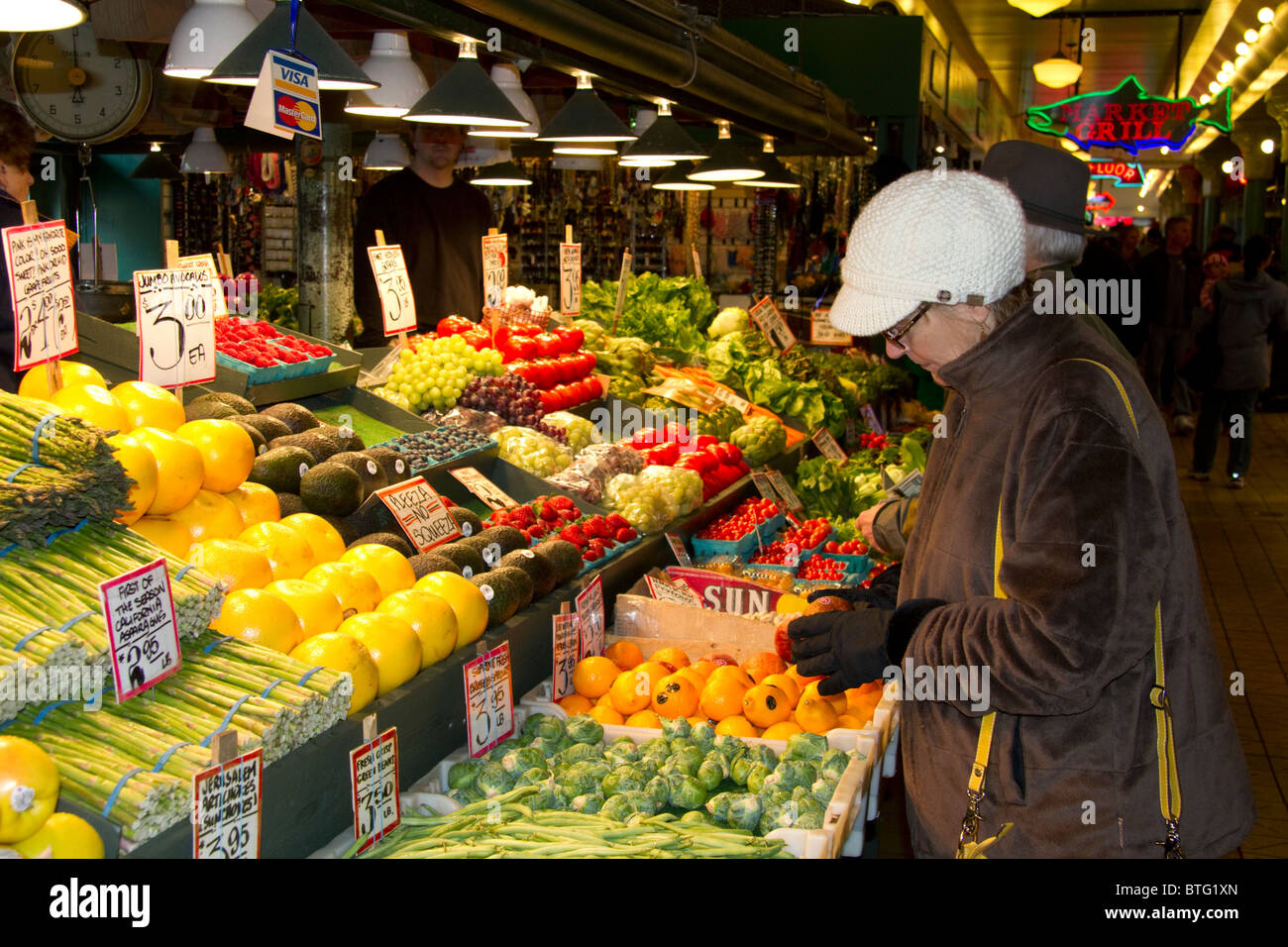 Vendor selling produce at the Pike Place Market in Seattle, Washington