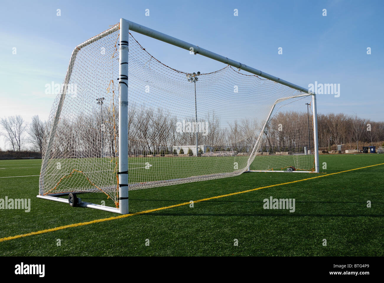 Wheeled mobile goalposts and net on a soccer pitch in Toronto Ontario Canada Stock Photo