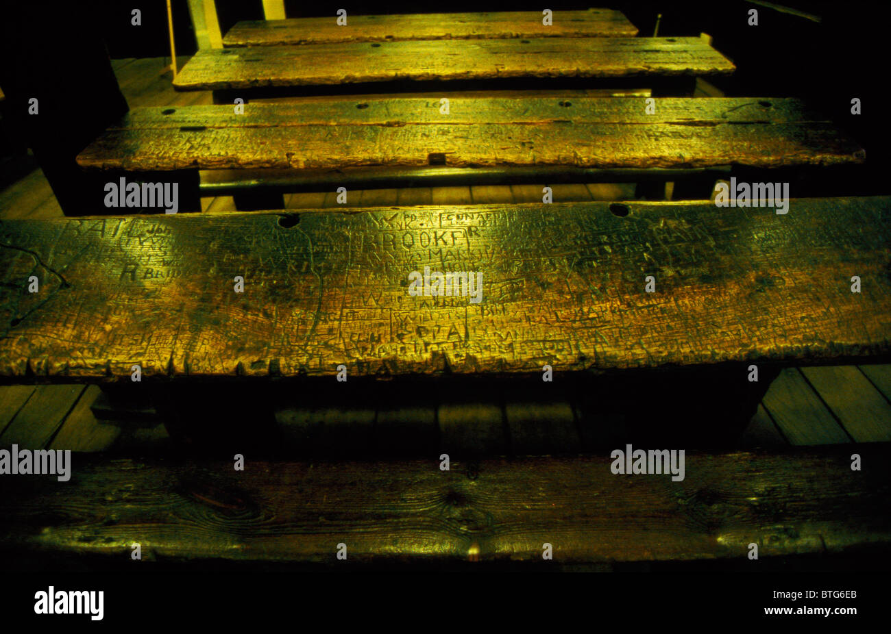 Desks at Eton College where students have carved their names for centuries, Eton, Near Windor England UK Stock Photo