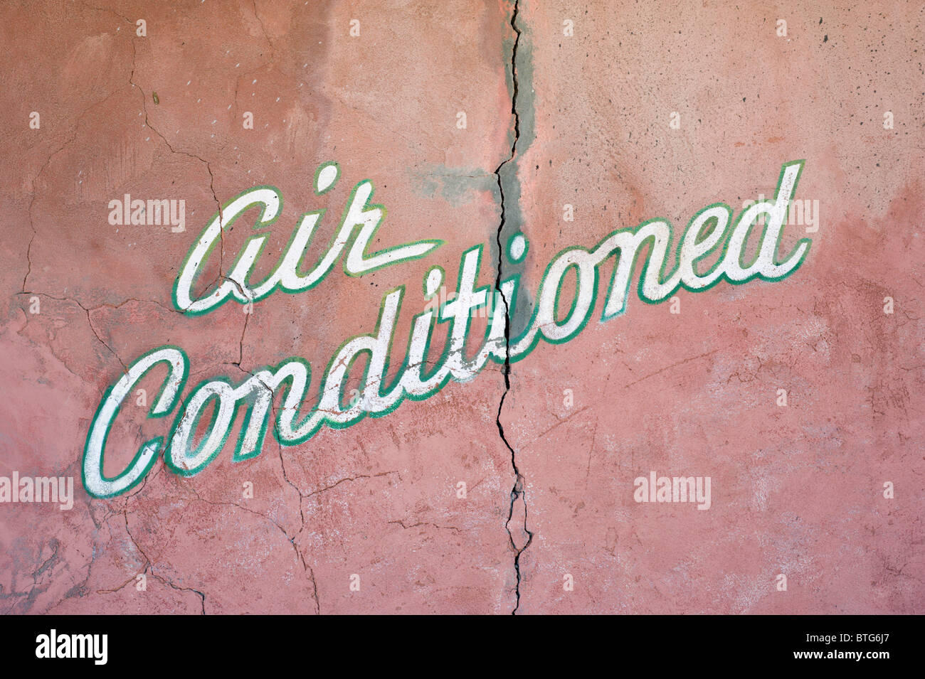A sign advertises a cooler climate awaits on the inside, in Carrizozo, New Mexico. Stock Photo