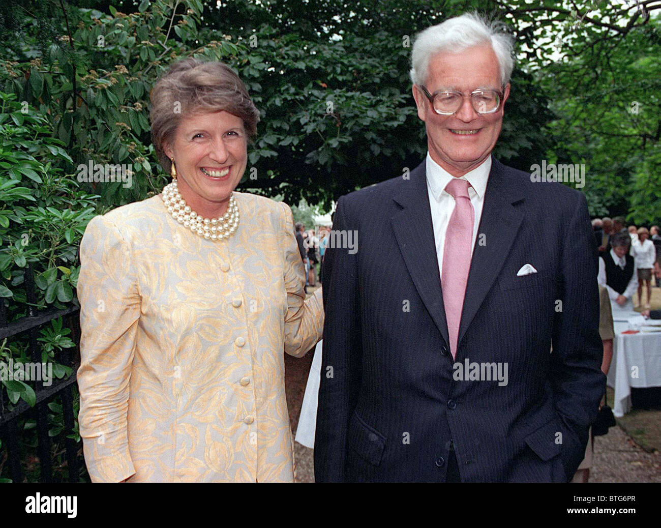 DOUGLAS HURD AND HIS WIFE JUDY AT DAVID FROST'S ANNUAL SUMMER PARTY IN