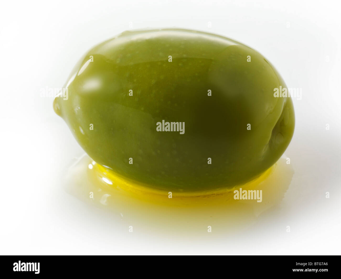 Whole green Queen olives Stock Photo