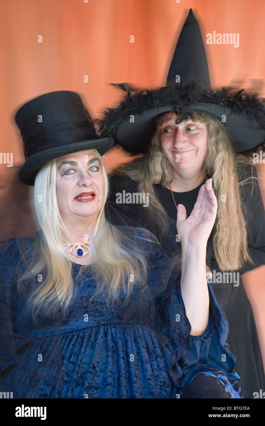 Two scary witches prepare to cast their spells on Halloween in Carrizozo, New Mexico. Stock Photo