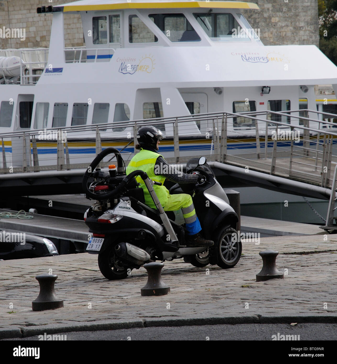 Neuforca highway cleansing scooter on patrol in La Rochelle western