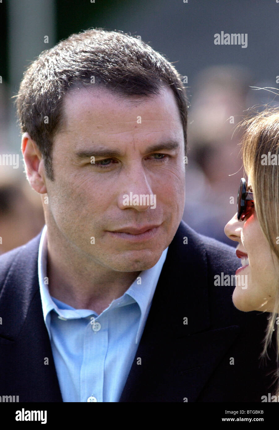 Hollywood star, actor John Travolta with his wife Kelly Preston at charity fundraiser polo match in Gloucestershire, UK Stock Photo