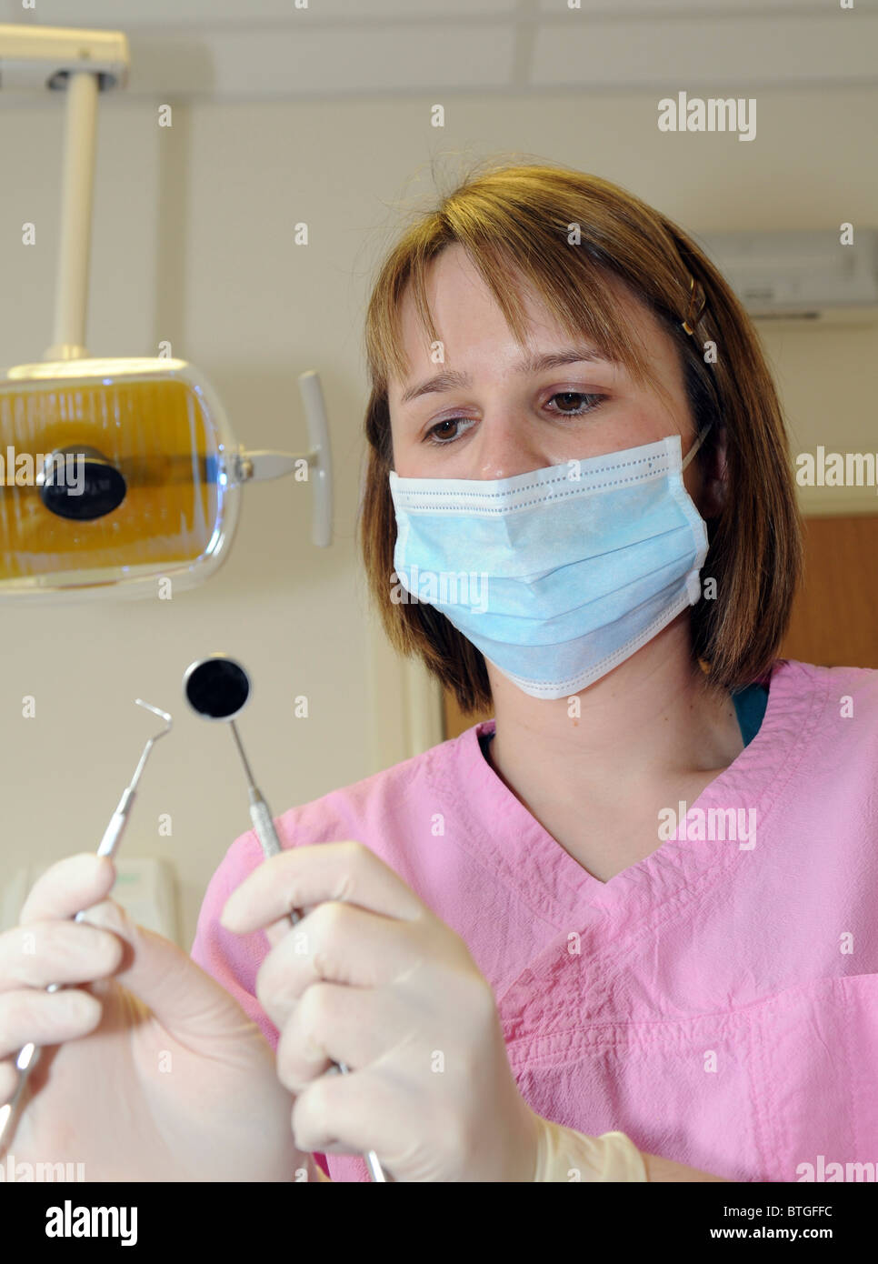 Female dentist ready to do a dental examination Stock Photo Alamy