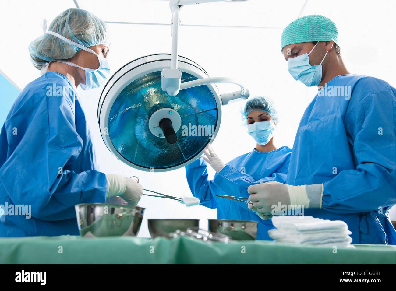 Medical personnel in operating room Stock Photo - Alamy