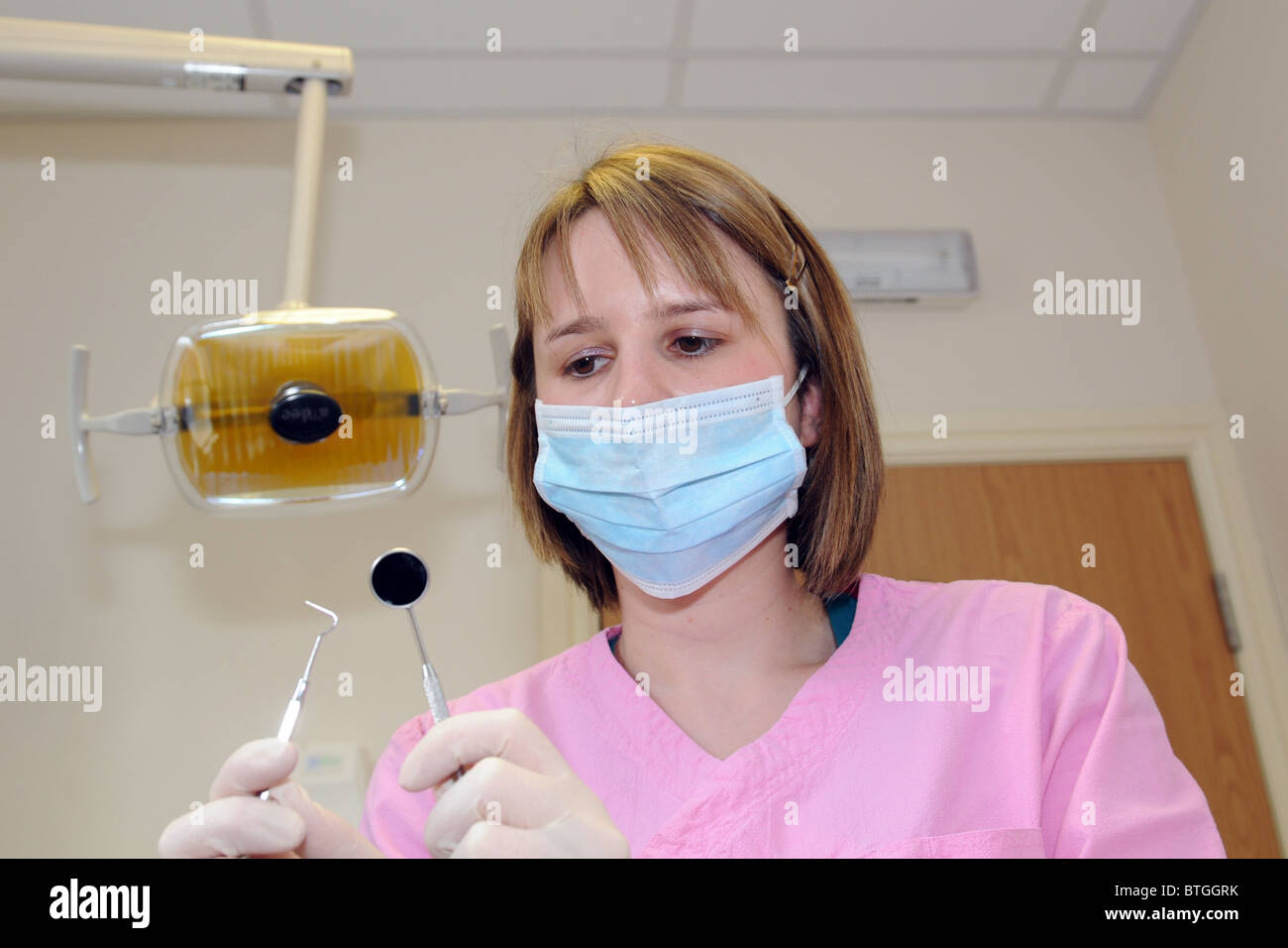 Female dentist ready to do a dental examination Stock Photo Alamy