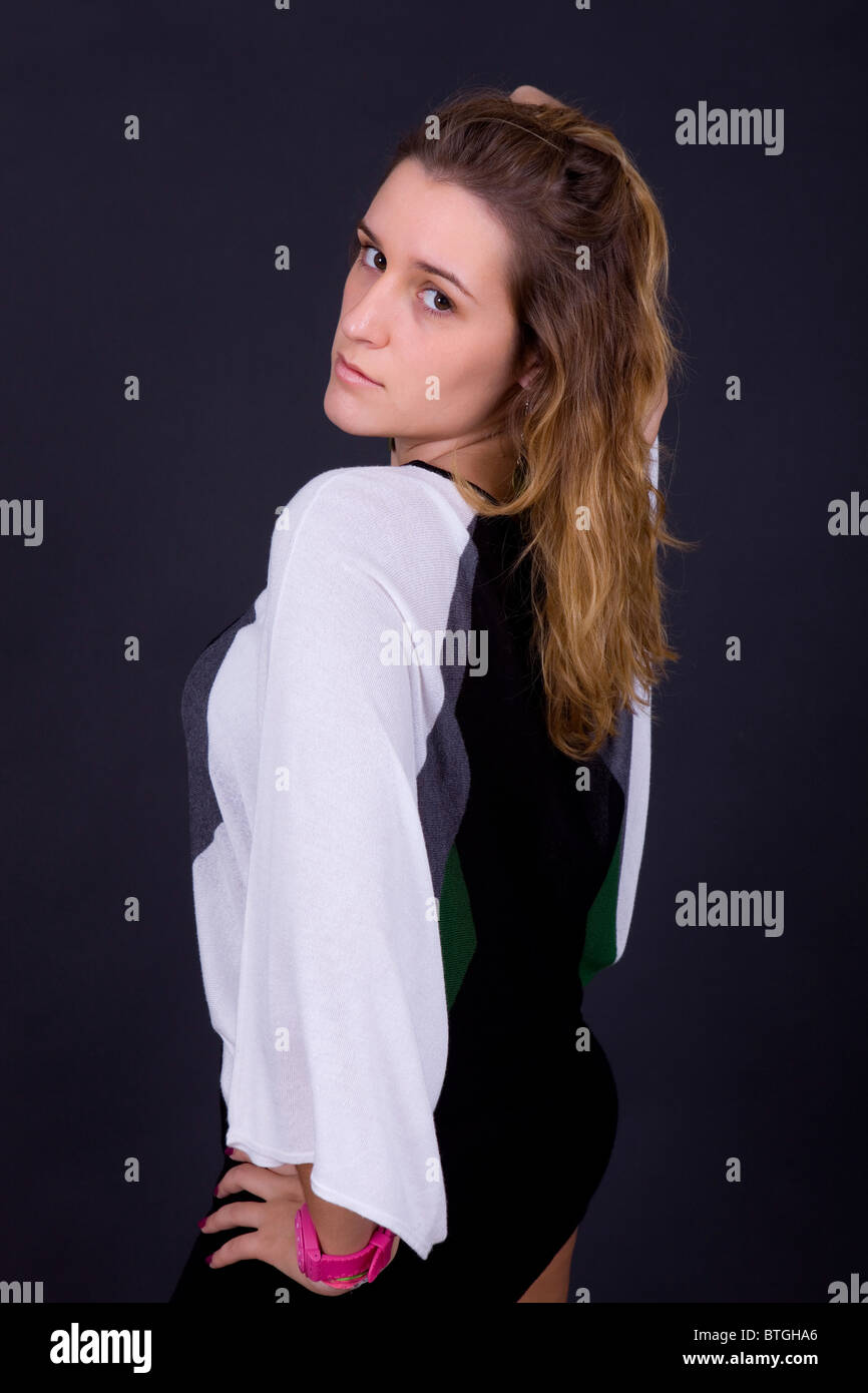 an young beautiful woman portrait on a black background Stock Photo - Alamy