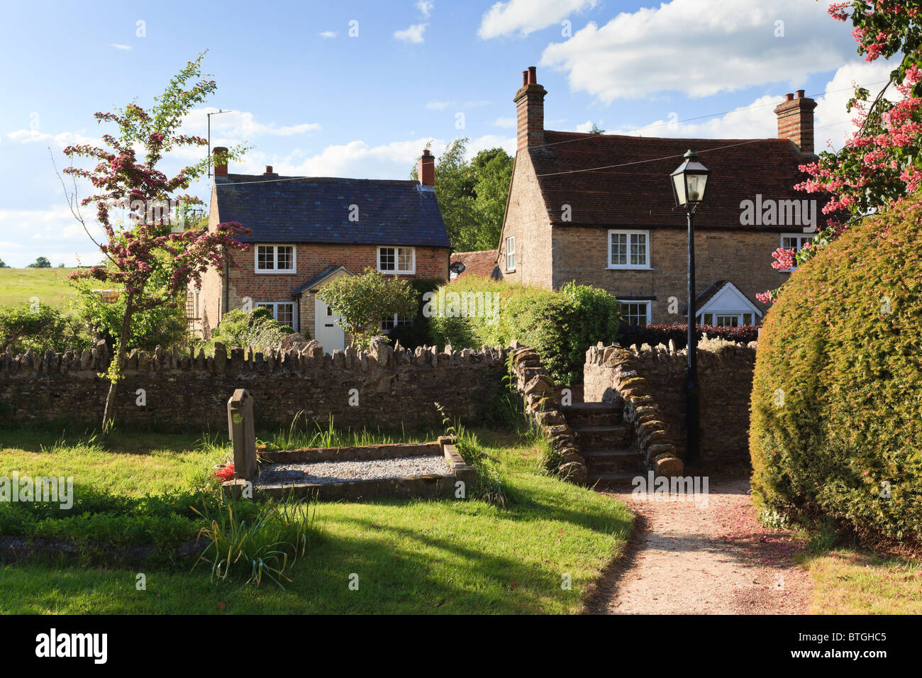 Churchyard path, Lamp, steps to the pretty village of Weston Underwood, Buckinghamshire, UK Stock Photo