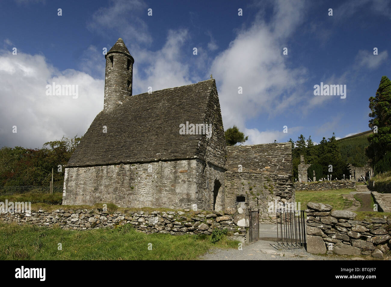 Irish Round Tower, Ancient Monastic Buildings, Glendalough, County Wicklow, Ireland Stock Photo