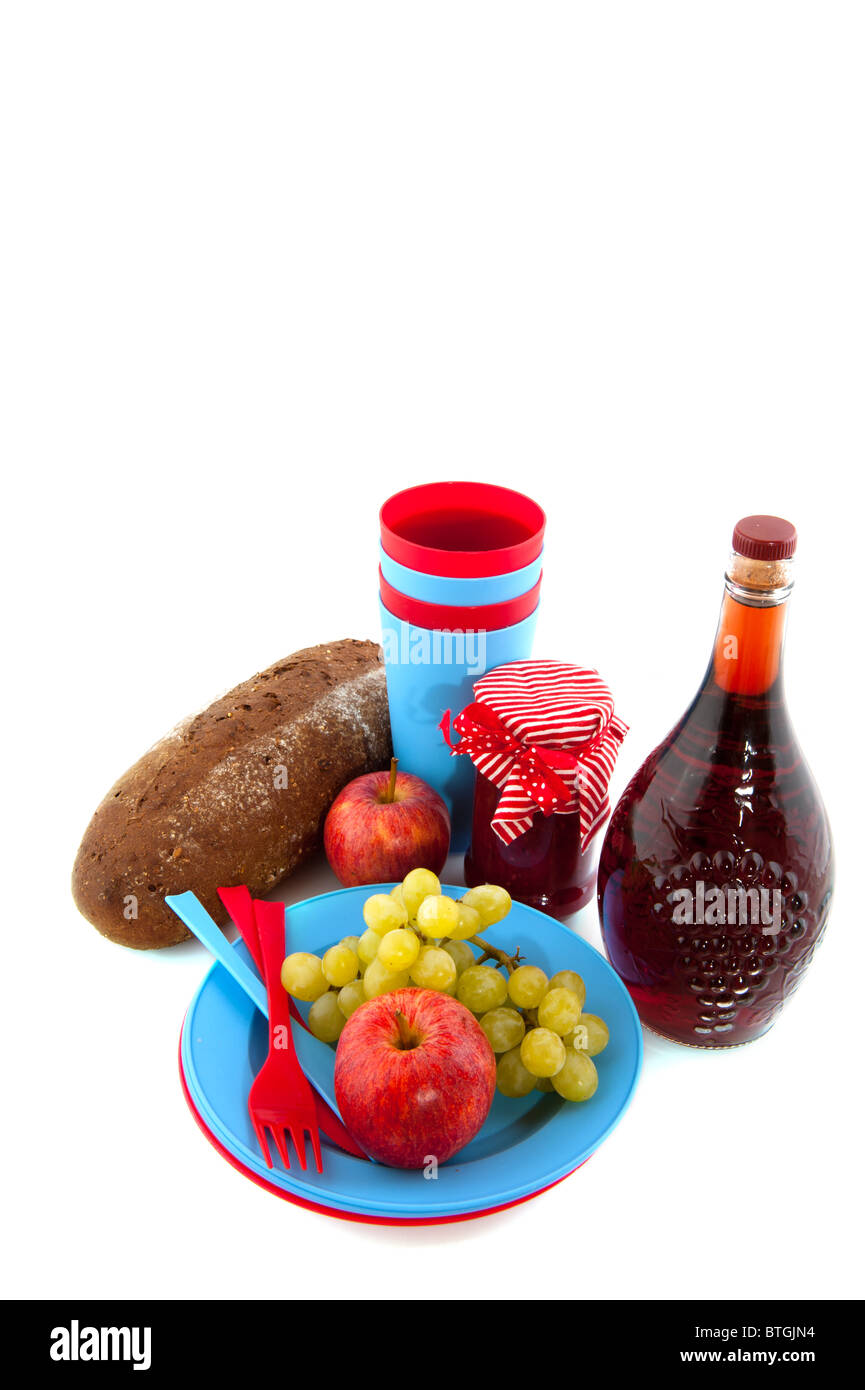 Colorful picnic food with bread fruit and wine Stock Photo - Alamy