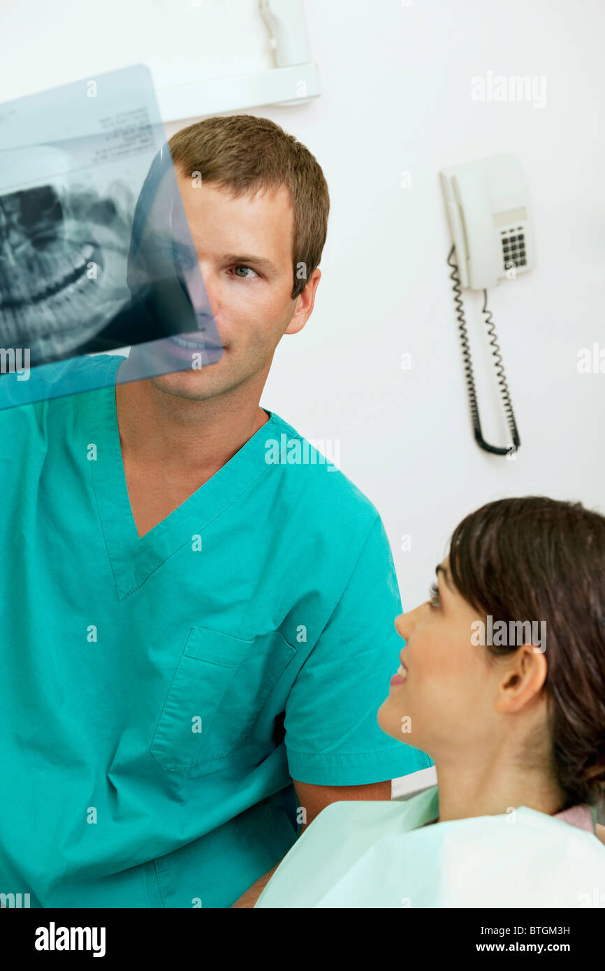 Patient with dentist holding dental panoramic xray Stock Photo Alamy