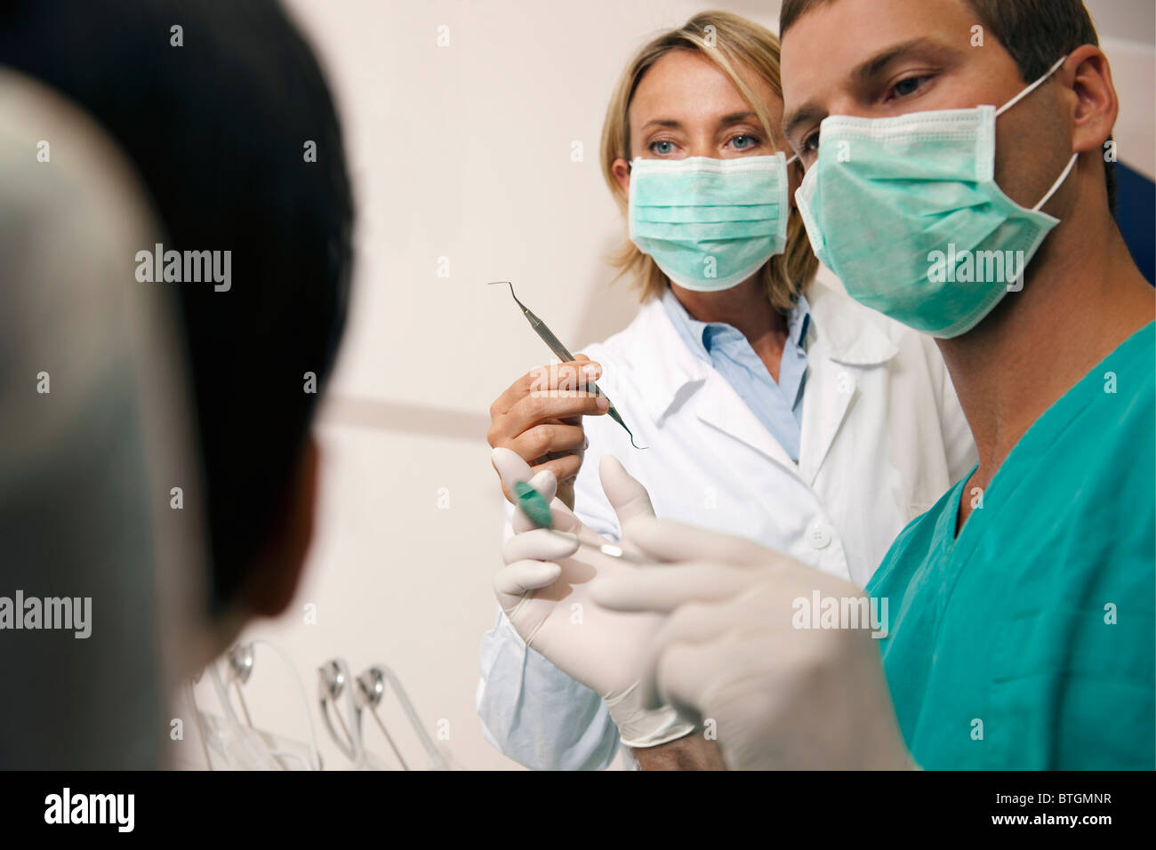 Dental professionals with patient Stock Photo Alamy