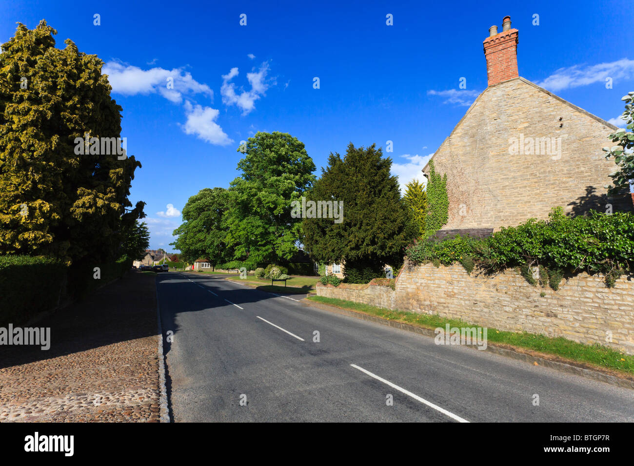 The High Street through the pretty Buckinghamshire Village of Weston Underwood, UK Stock Photo