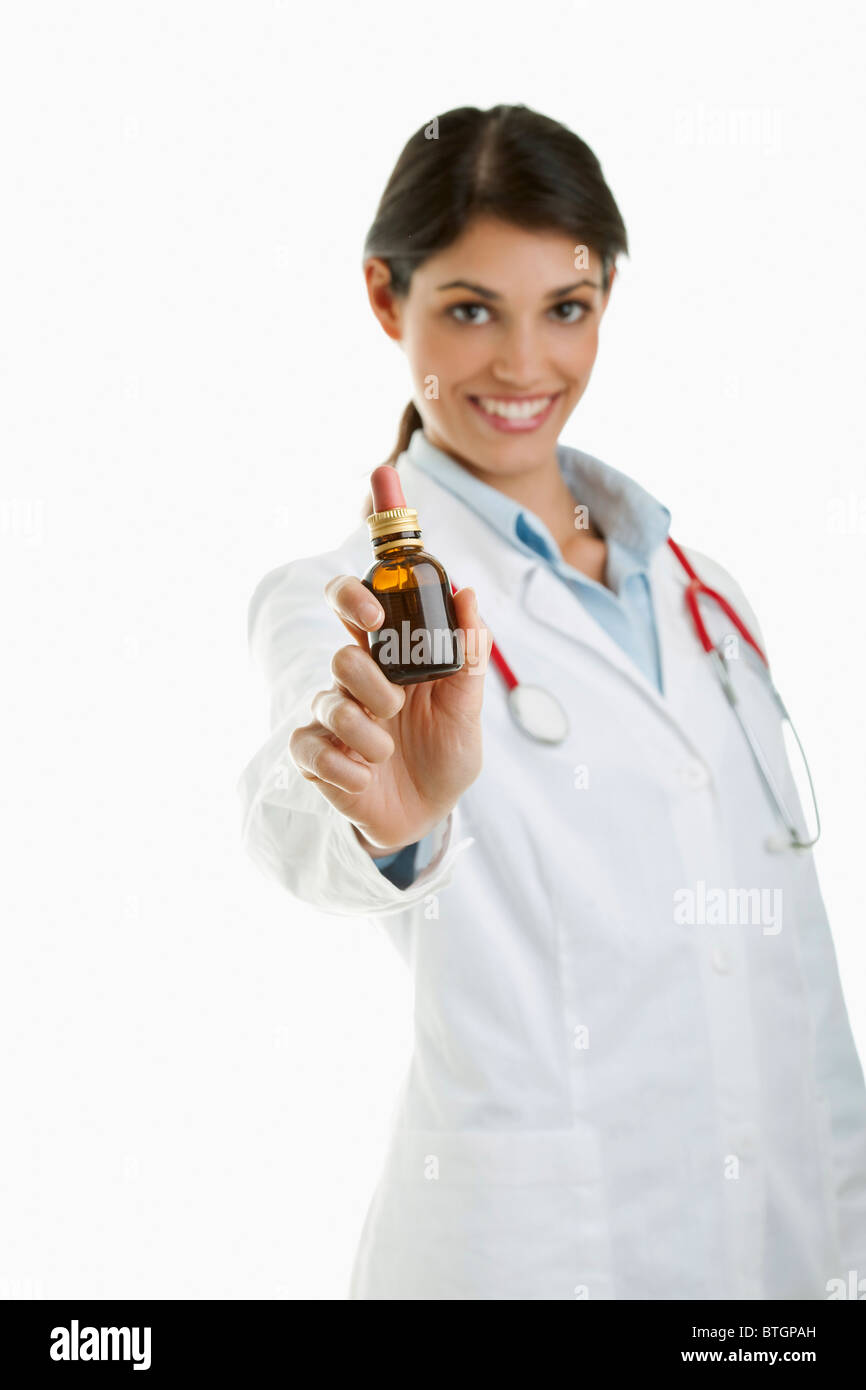Doctor holding medicine bottle Stock Photo Alamy