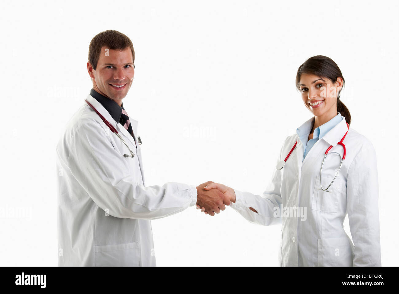 Two doctors shaking hands Stock Photo