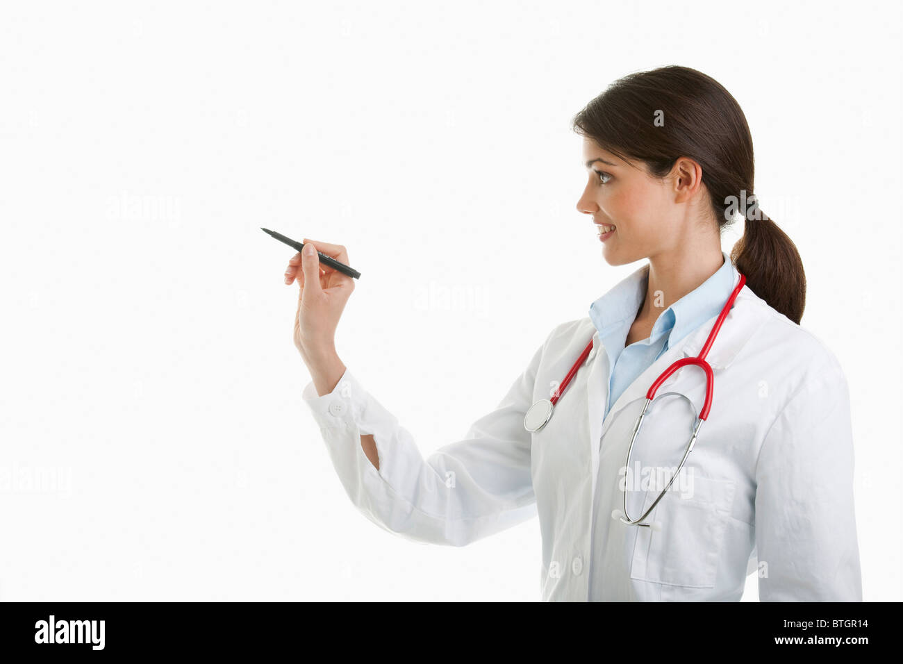 Doctor writing with pen Stock Photo