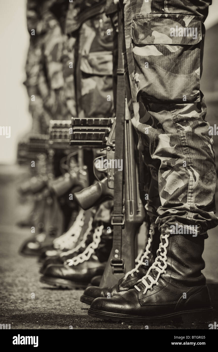 close up of military boots and men in the army in parade with gun and  uniform Stock Photo - Alamy