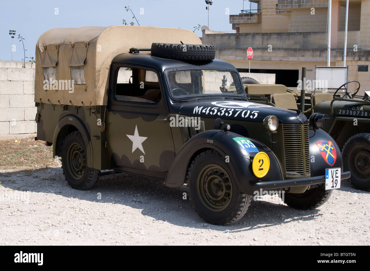 A preserved wartime Austin Tilly light utility pickup truck on show at a Military Mtarfa weekend in Malta Stock Photo