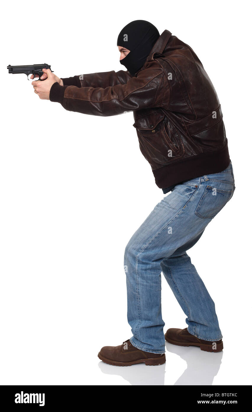 classic thief with gun isolated on white background Stock Photo