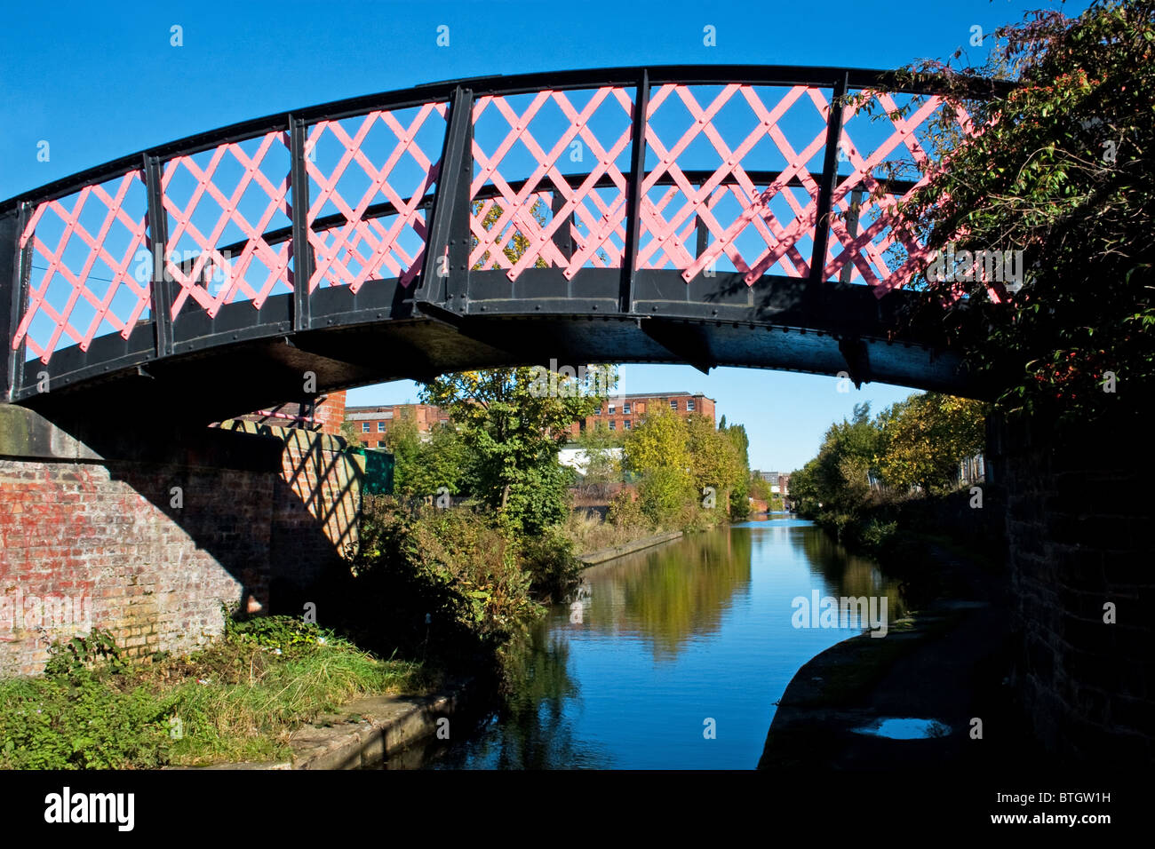 Jeremy Brook wrought iron footbridge, Ashton canal, Ashton under Lyne, Tameside, Greater Manchester, England, UK Stock Photo