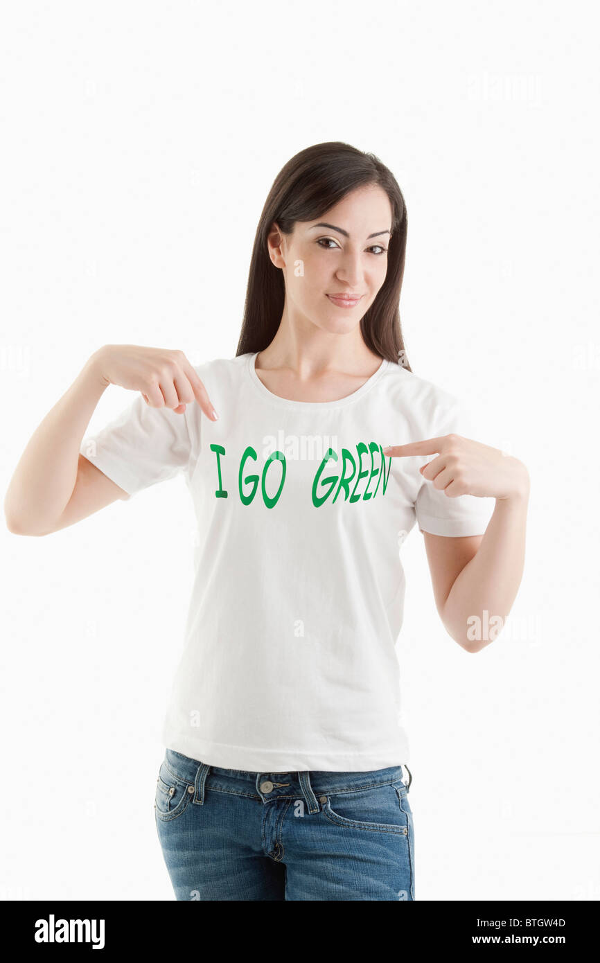 Young woman wearing 'I go green' tshirt Stock Photo