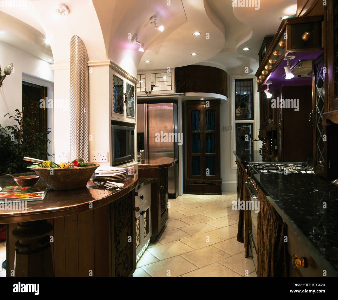 Halogen Spotlights On Ceiling In Modern Kitchen With Ceramic Tiled