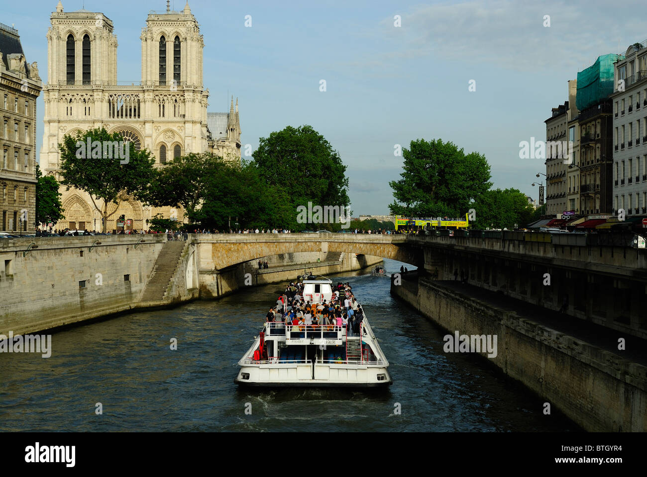 Bateau-mouche boat navigating on the Seine river, Paris, capital of France Stock Photo