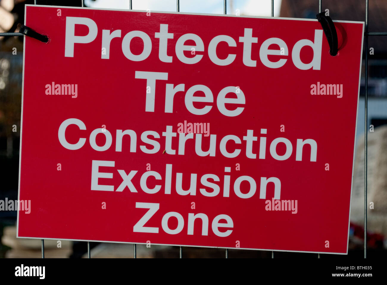 A warning sign for protected trees Stock Photo Alamy