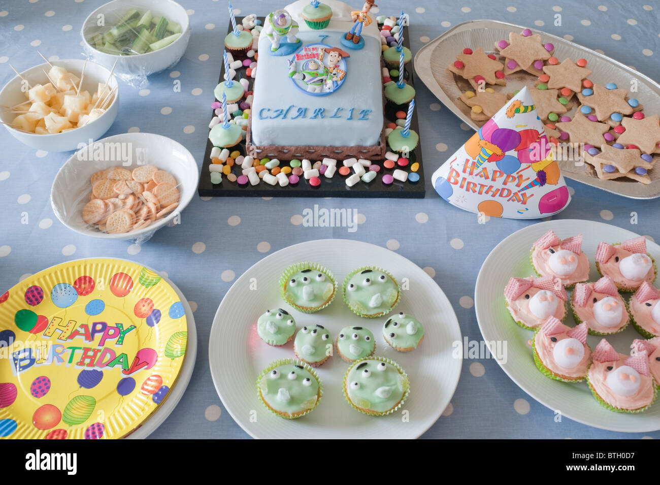 A table full of food for a childs Birthday Party in the Uk Stock Photo