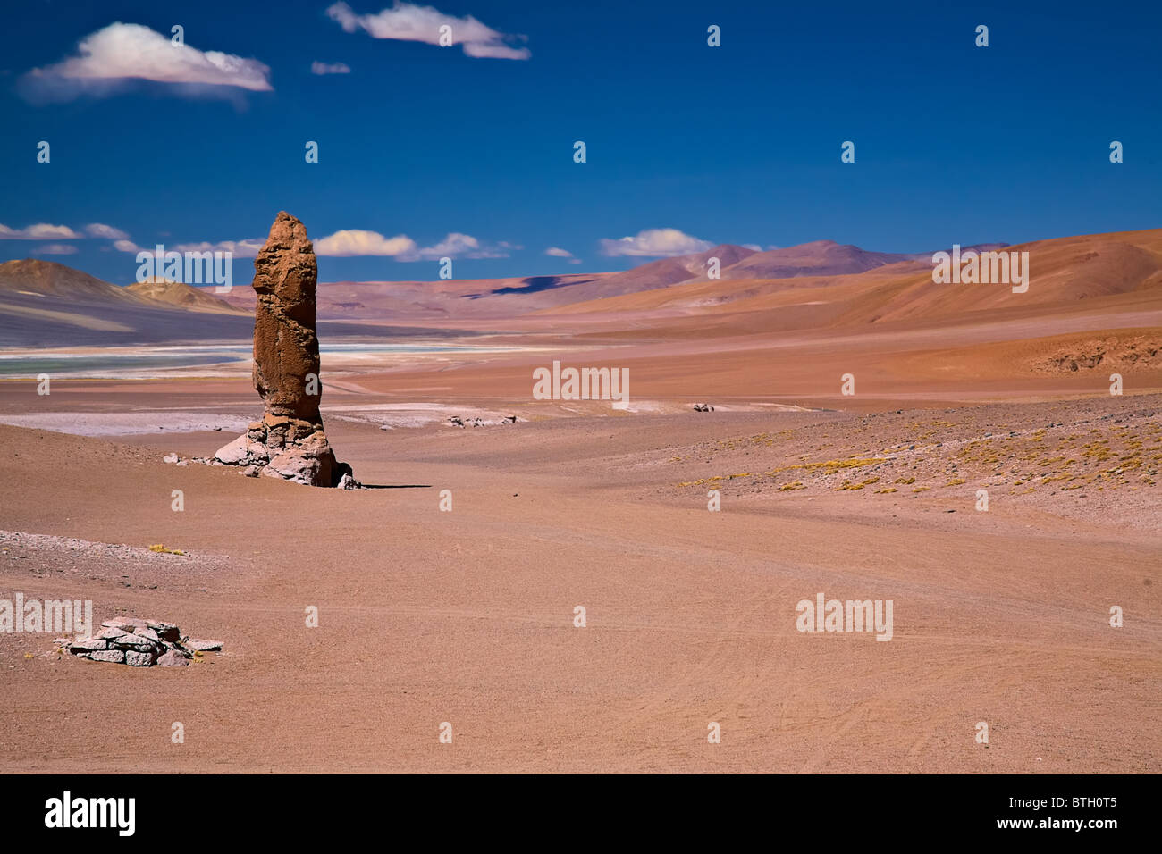 geological monolith close to Salar Aguas Calientes and Cerro Losloyo, desert Atacama, Los Flamencos National Reserve, Chile Stock Photo