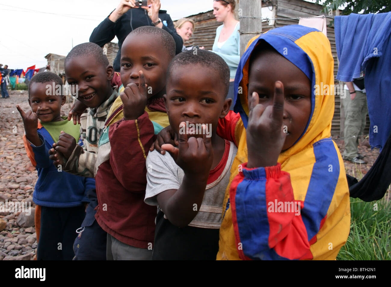 South african black boy hands hi-res stock photography and images - Alamy