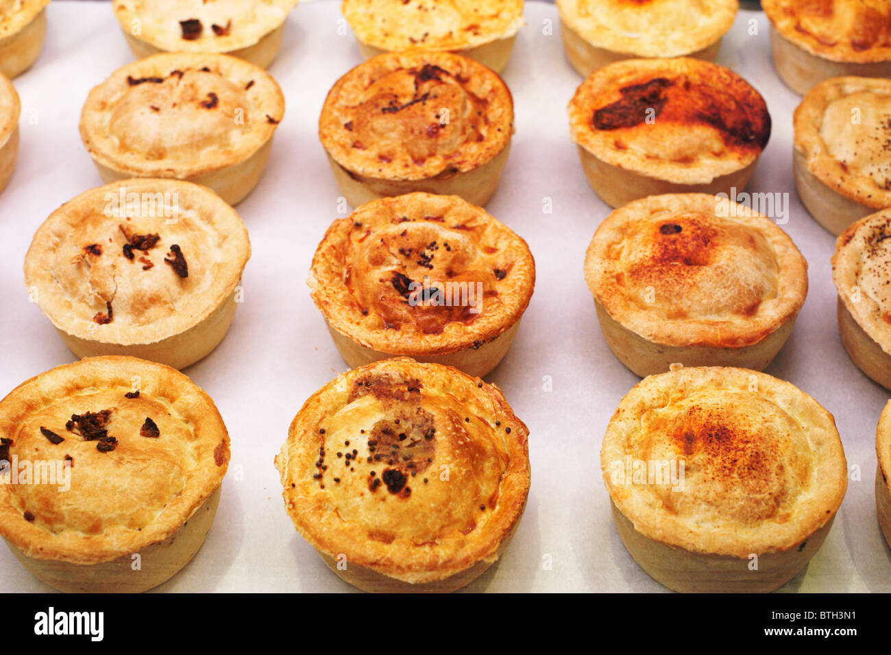 A selection of meat pies for sale at the Oxford Covered Market. Stock Photo