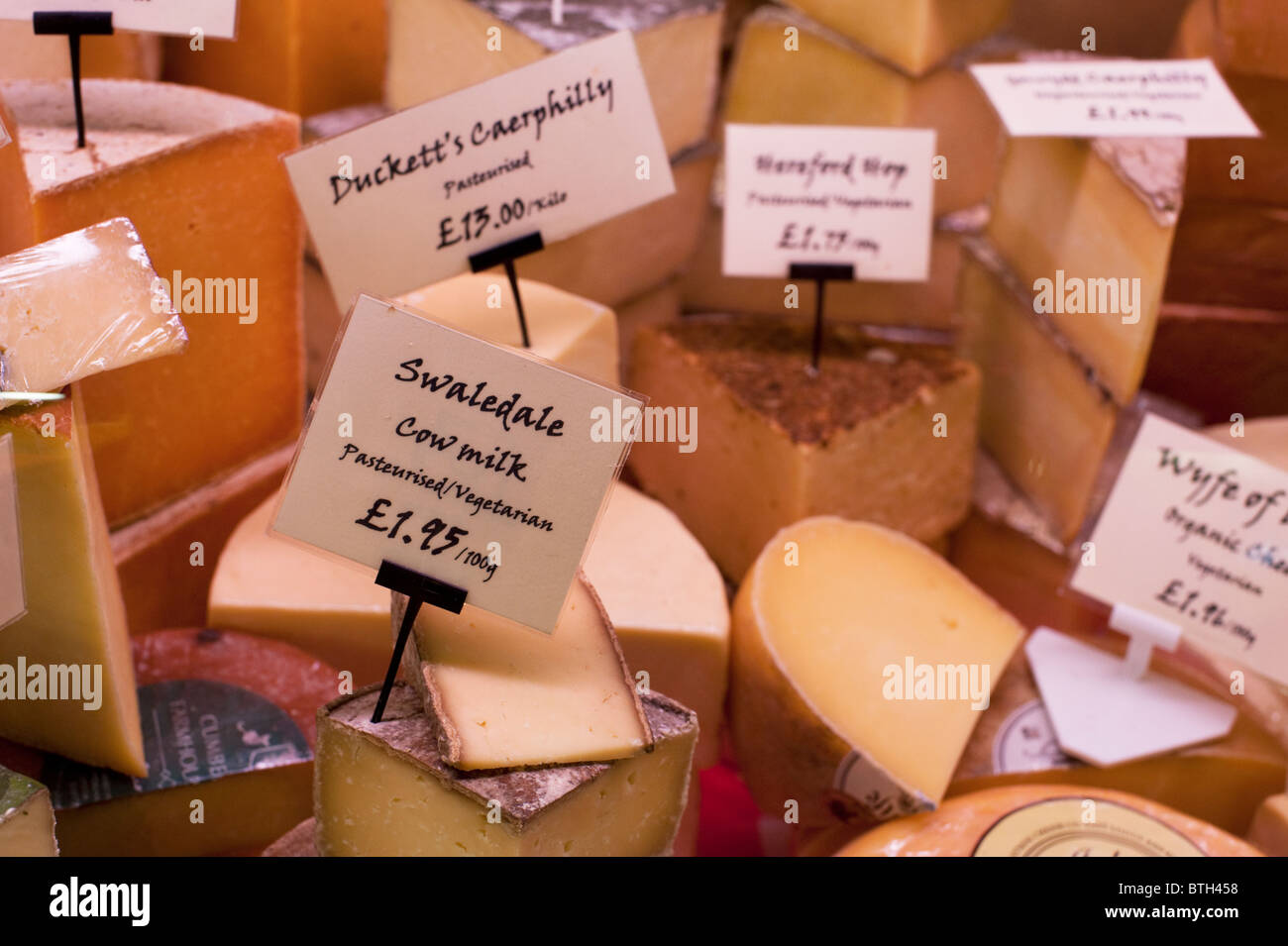 English cheeses for sale at a cheese shop in the Oxford Covered Market