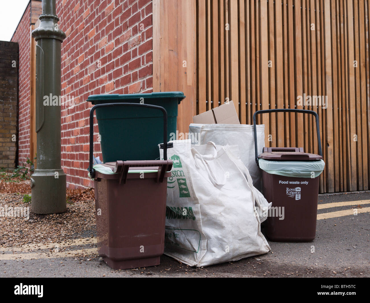 Recycle bins waiting for collection Stock Photo Alamy