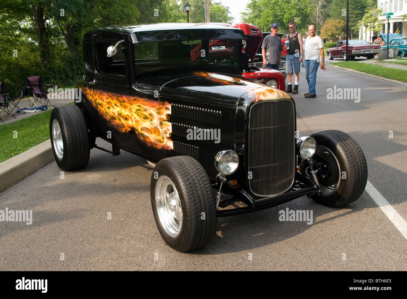 Auto- 1930 Ford Coupe with flames. Car show in Franklin, Ohio, USA. Stock Photo