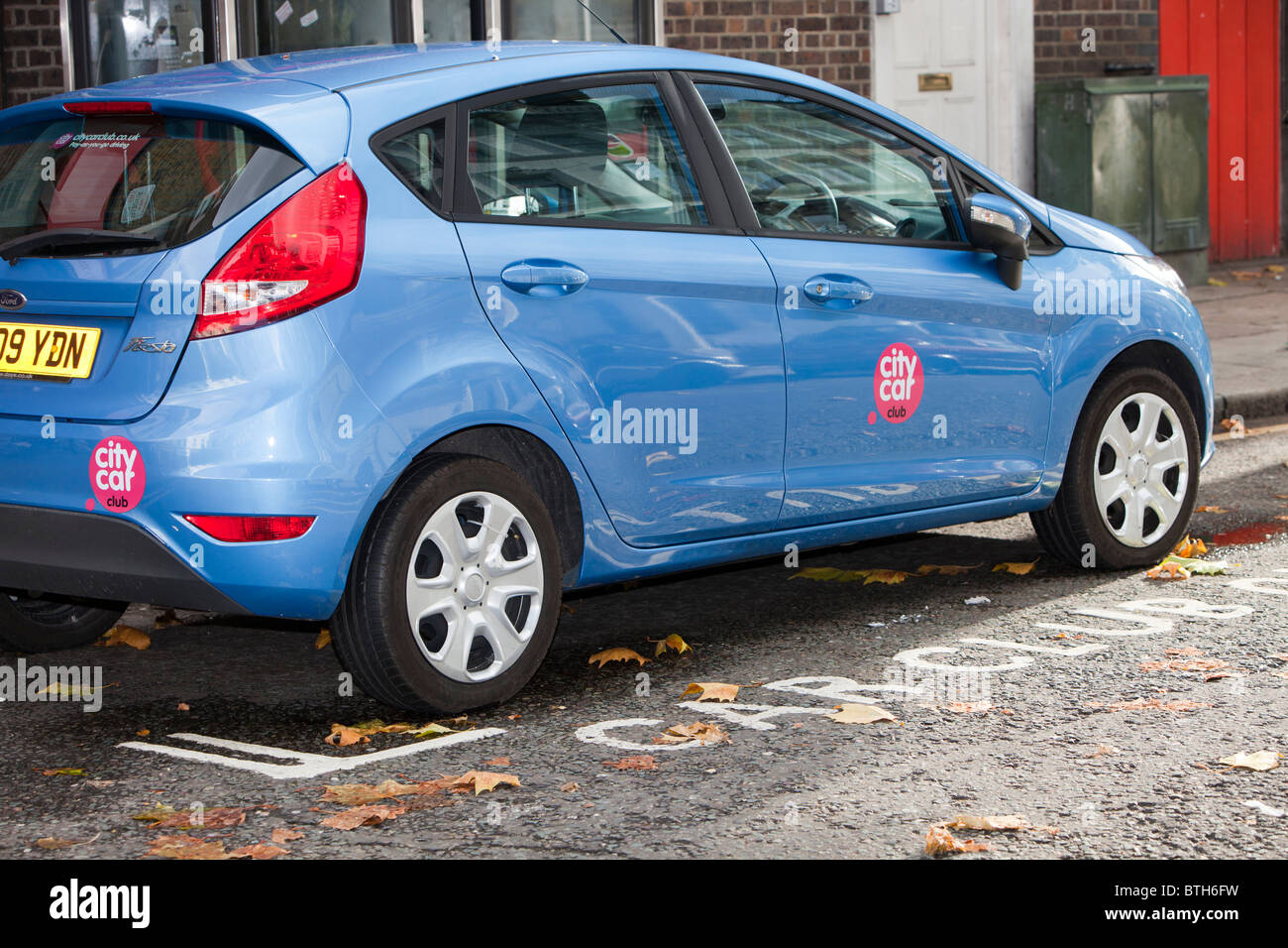 A parking space reserved for car club vehicles. This car share scheme is a great way of cutting down on your carbon footprint Stock Photo