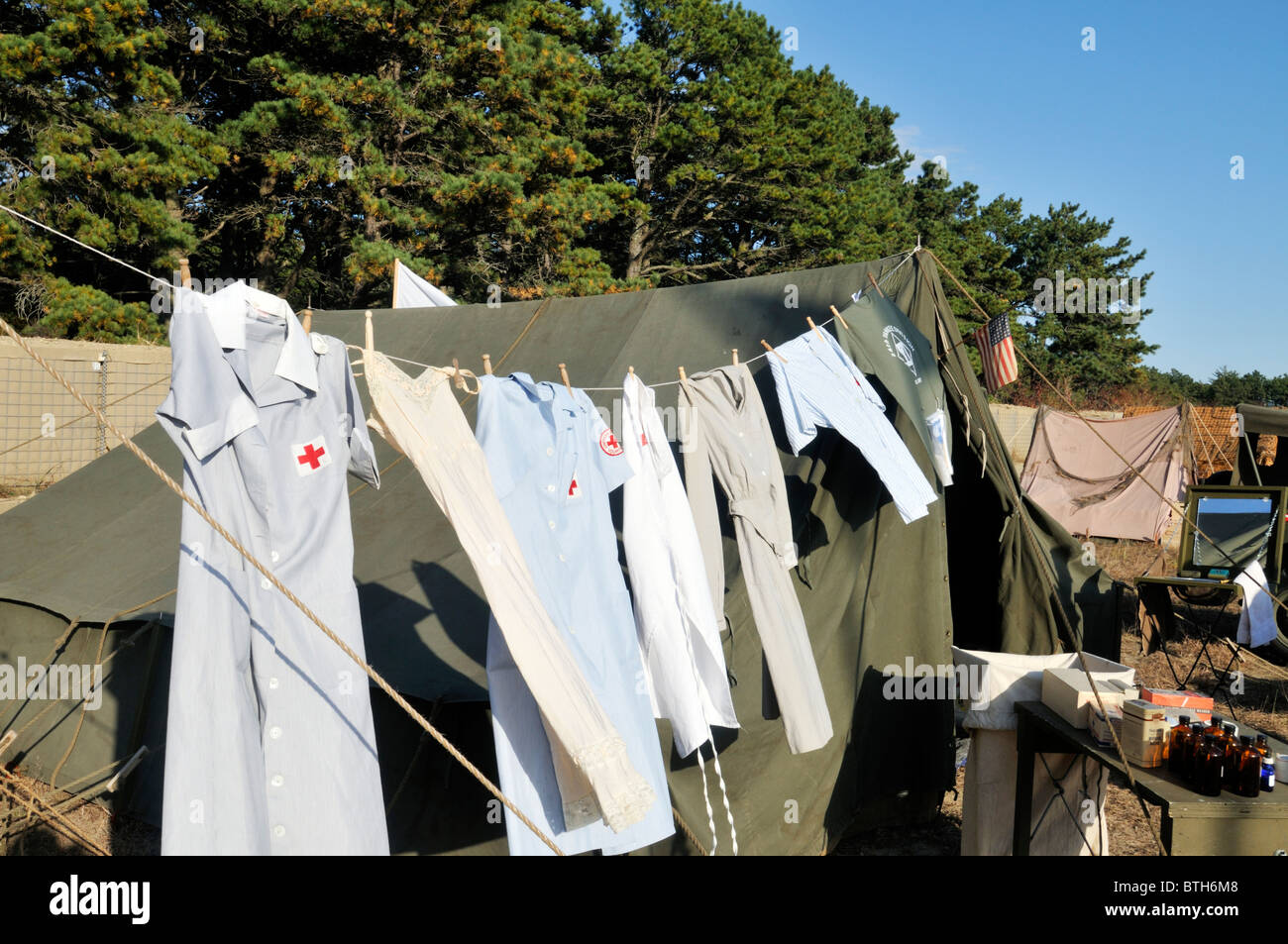 Laundry of nurses hanging outside of World War II First Aid Tent at a reenactment of WWII US military Camp at MMR Cape Cod. Stock Photo