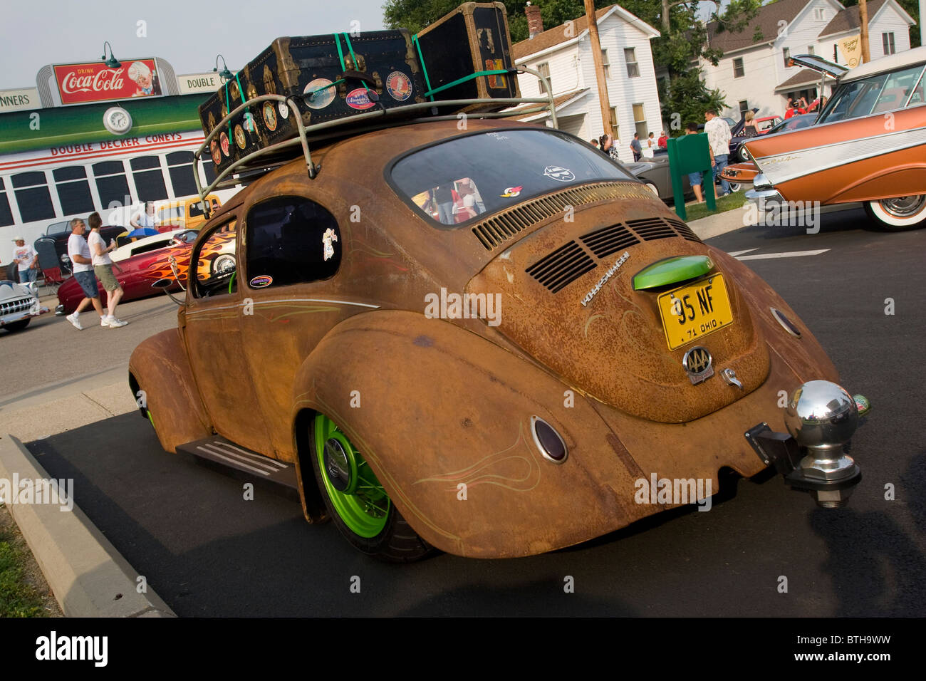 Auto- 1971 Volkswagon Beetle with modified shape, lots of rust, and extremely large trailer hitch. 95NF Stock Photo
