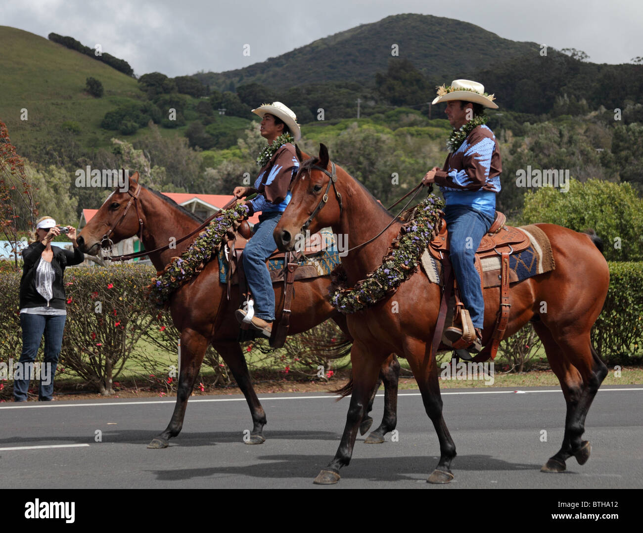 Men ride in the 35th annual Waimea Paniolo Parade on the Big Island of Hawaii Stock Photo