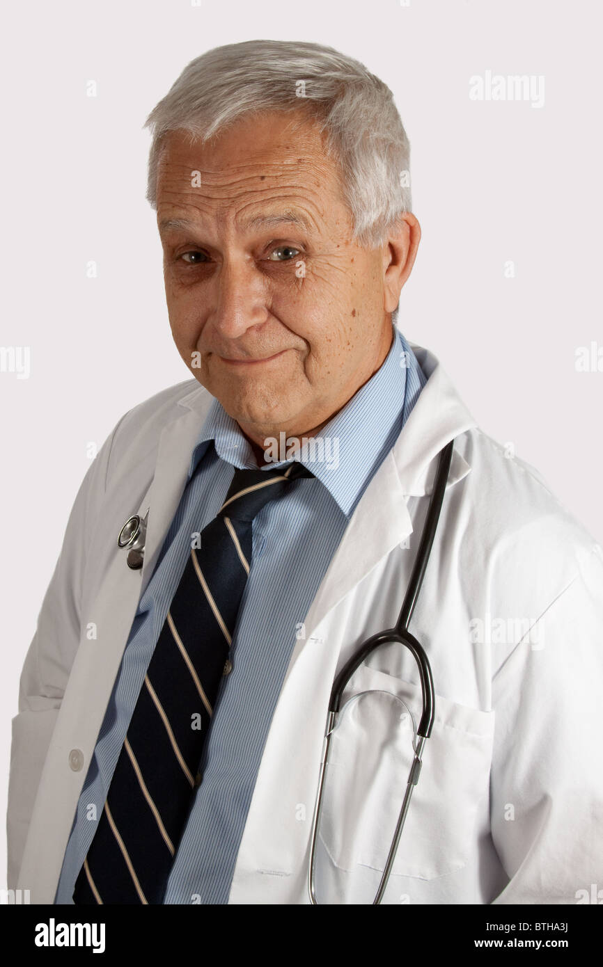 Senior doctor wearing coat hi-res stock photography and images - Alamy