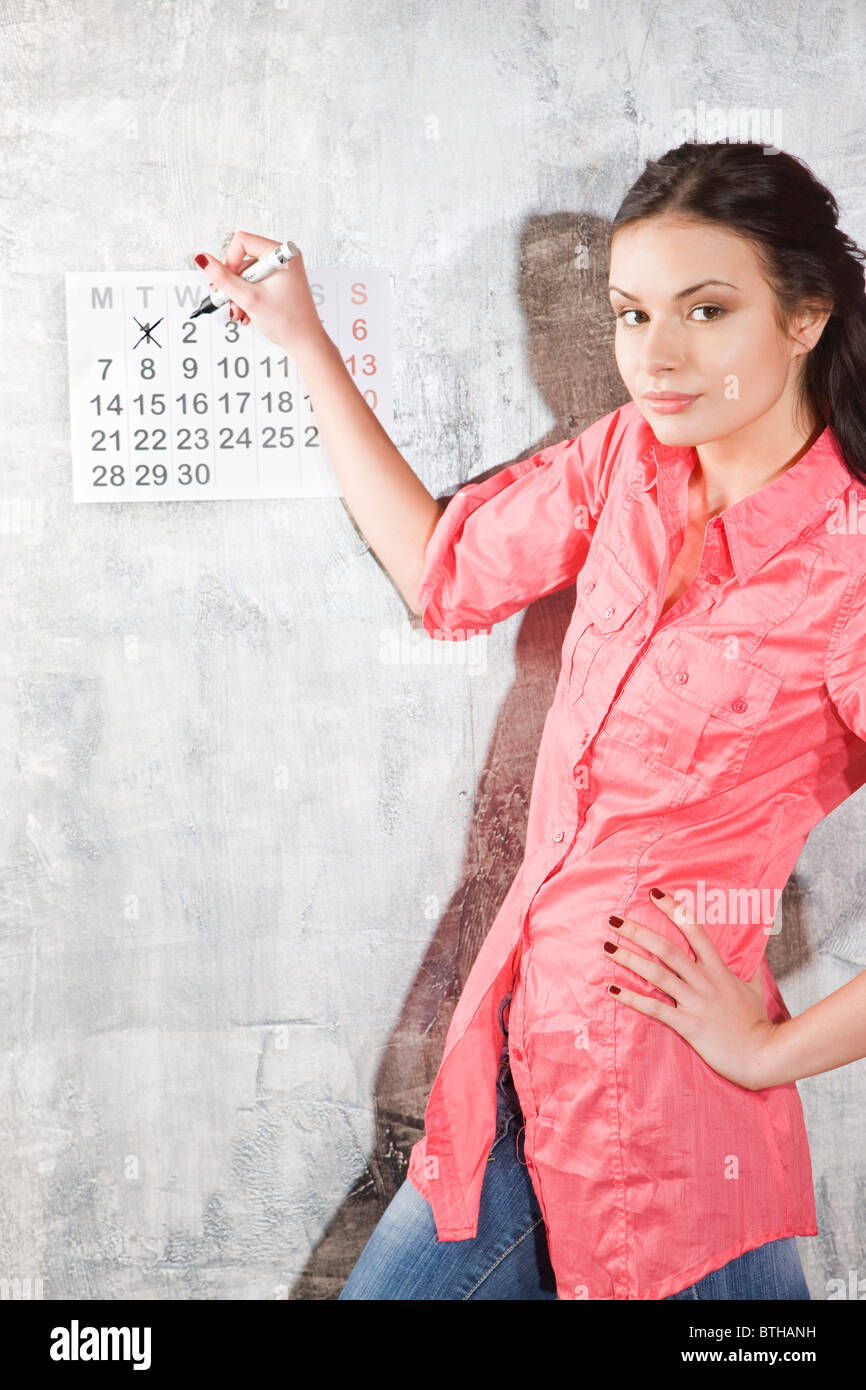 young woman with calendar Stock Photo Alamy